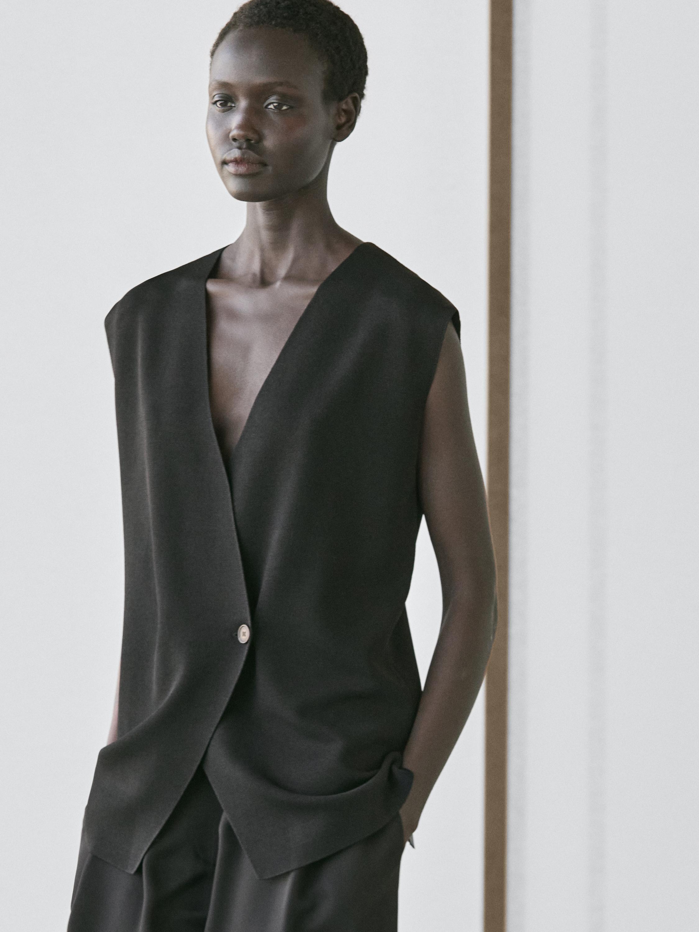 Long double-breasted vest